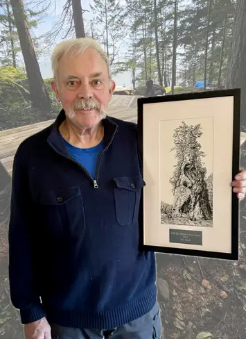 Nick Heath holding Ray Pillman Award