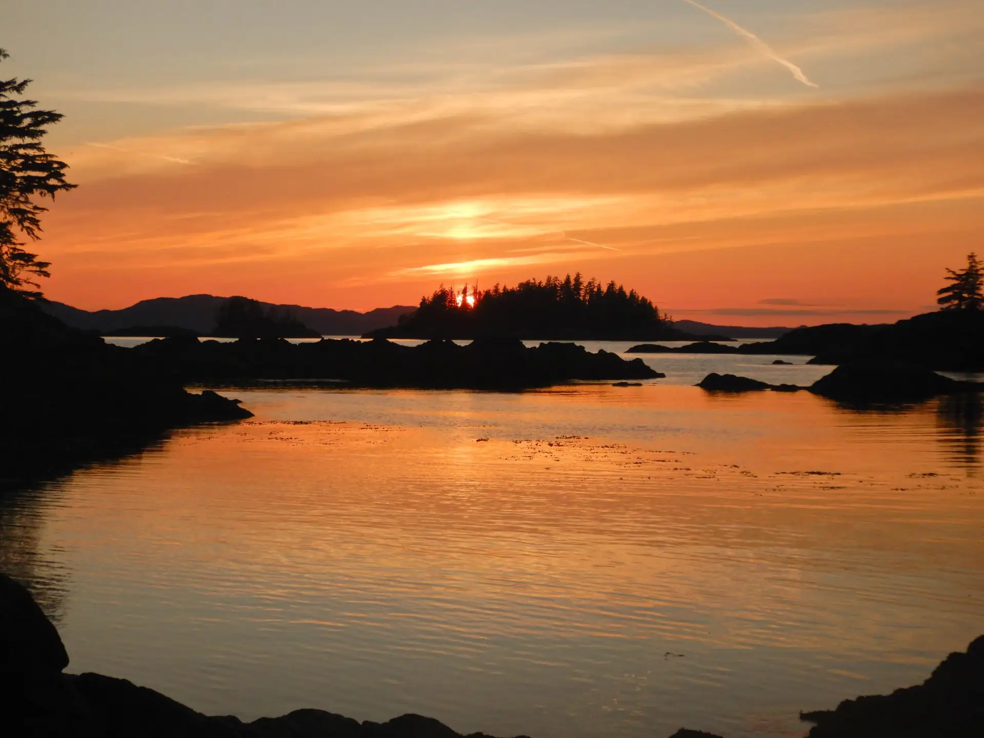 sunset photo showing islands and water